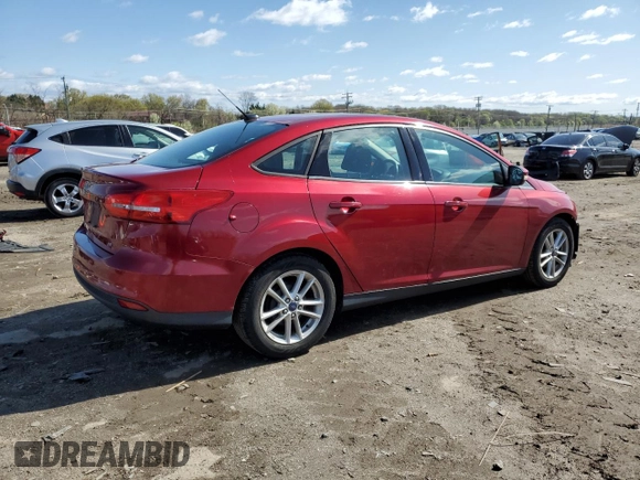 2016 Ford Focus SE with VIN 1FADP3F23GL232985, listed as a Copart auction lot 51309085 with 112,420 mi miles and Salvage title. Bid and sale history available at DreamBid. Image 3.