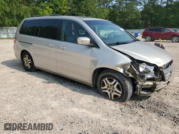 2006 Honda Odyssey EX-L with VIN 5FNRL38706B037805, listed as a Copart auction lot 57390365 with 219,554 mi miles and Salvage title. Bid and sale history available at DreamBid. Image 4.
