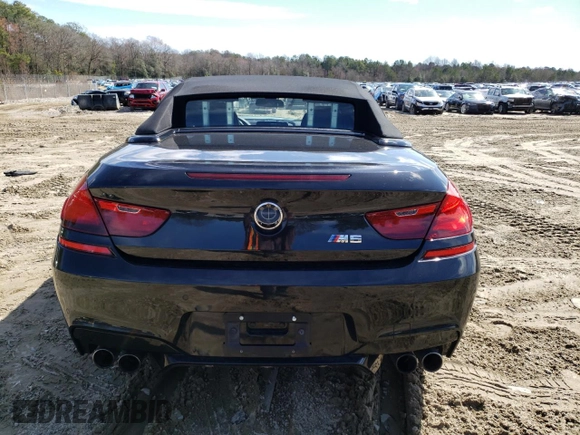 2018 BMW M6 z VIN WBS6G9C50JD950282, wystawiony jako Copart lot #46023174 z przebiegiem 14 184 mil mil oraz . Historia ofert i sprzedaży dostępna na DreamBid. Obrazek 6.