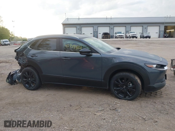 2023 Mazda CX-30 S Carbon Edition with VIN 3MVDMBCM4PM577619, listed as a IAAI auction lot 42219801 with 24,784 mi miles and . Bid and sale history available at DreamBid. Image 13.