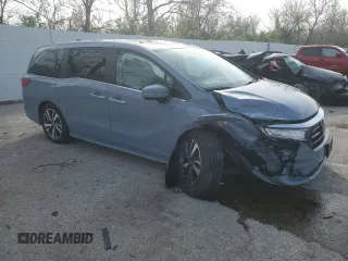 2023 Honda Odyssey Touring with VIN 5FNRL6H83PB053962, listed as a Copart auction lot 51461865 with 24,808 mi miles and Salvage Title. Bid and sale history available at DreamBid. Image 4.