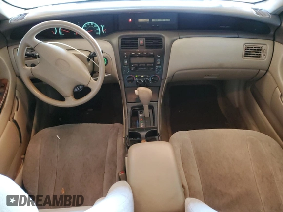 2001 Toyota Avalon XL with VIN 4T1BF28B71U123194, listed as a Copart auction lot 84050604 with 199,807 mi miles and Salvage Title. Bid and sale history available at DreamBid. Image 8.