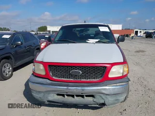2000 Ford F-150 XL with VIN 1FTZX1729YNC32076, listed as a IAAI auction lot 41523364 with 216,726 mi miles. Bid and sale history available at carsss.com. Image 12.
