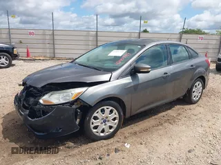 2012 Ford Focus SE with VIN 1FAHP3F21CL199240, listed as a IAAI auction lot 42409719 with 137,684 mi miles and . Bid and sale history available at DreamBid. Image 2.