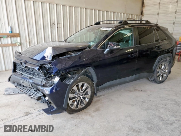 2021 Toyota RAV4 XLE Premium with VIN 2T3C1RFV7MC092468, listed as a Copart auction lot 59109315 with 98,552 mi miles and Salvage title. Bid and sale history available at DreamBid. Image 1.