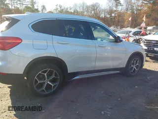 2019 BMW X1 xDrive28i with VIN WBXHT3C57K5L89697, listed as a IAAI auction lot 40729513 with 46,319 mi miles and . Bid and sale history available at DreamBid. Image 13.