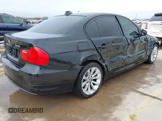 2011 BMW 3 Series 328i xDrive with VIN WBAPK7C59BF082168, listed as a IAAI auction lot 41593485 with 203,099 mi miles. Bid and sale history available at carsss.com. Image 4.