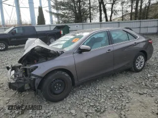 2015 Toyota Camry XLE with VIN 4T1BF1FKXFU031159, listed as a Copart auction lot 49007265 with 105,339 mi miles and Salvage Title. Bid and sale history available at carsss.com. Image 1.