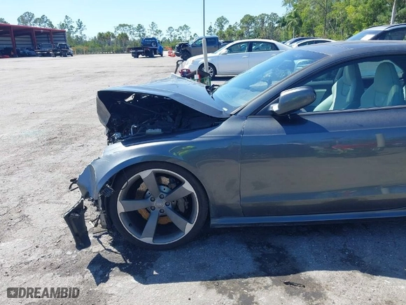 2013 Audi RS 5 with VIN WUAC6AFR2DA900747, listed as a IAAI auction lot 41822517 with 76,468 mi miles. Bid and sale history available at carsss.com. Image 6.
