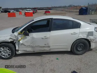 2009 Nissan Altima S with VIN 1N4AL21E09C126880, listed as a IAAI auction lot 41739604 with 258,940 mi miles and . Bid and sale history available at DreamBid. Image 15.