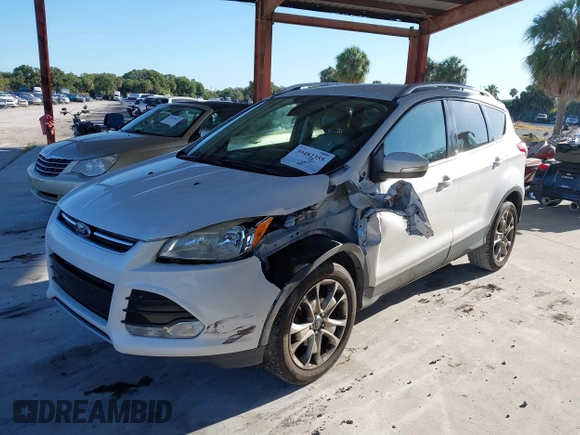 2015 Ford Escape Titanium with VIN 1FMCU0J96FUA48615, listed as a IAAI auction lot 39482355 with 186,340 mi miles and . Bid and sale history available at DreamBid. Image 2.