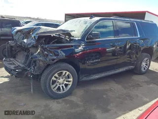 2016 Chevrolet Suburban LT with VIN 1GNSKHKC0GR398087, listed as a IAAI auction lot 41869749 with 297,675 mi miles. Bid and sale history available at carsss.com. Image 22.