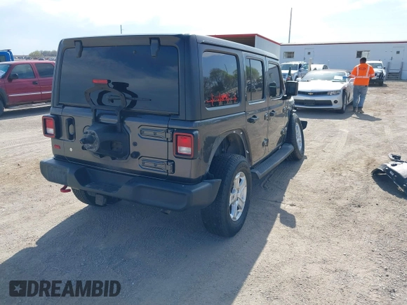 2019 Jeep Wrangler Unlimited Sport S with VIN 1C4HJXDG0KW541940, listed as a IAAI auction lot 42100255 with 68,309 mi miles and . Bid and sale history available at DreamBid. Image 4.