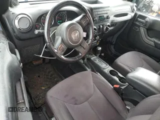 2014 Jeep Wrangler Sport с VIN 1C4AJWAG1EL117219, выставлен на аукционе Copart как лот 59696355 с пробегом 105 865 миль миль и Списание • Salvage title. История ставок и продаж доступна на DreamBid. Изображение 8.
