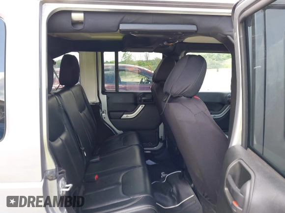 2018 Jeep Wrangler Unlimited Sahara with VIN 1C4BJWEGXJL806832, listed as a IAAI auction lot 42605892 with 90,535 mi miles and . Bid and sale history available at DreamBid. Image 8.