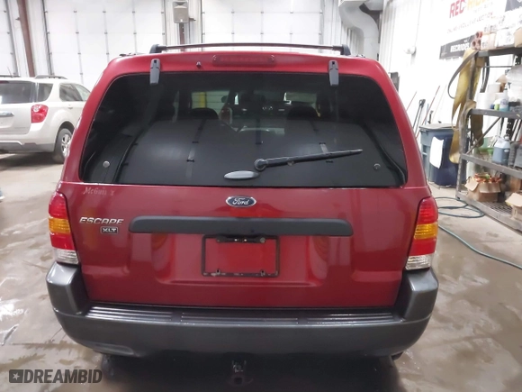 2003 Ford Escape XLT Popular 2 with VIN 1FMCU93173KA52806, listed as a IAAI auction lot 41696250 with 138,338 mi miles. Bid and sale history available at carsss.com. Image 16.