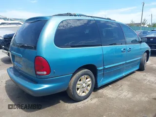 1996 Dodge Grand Caravan with VIN 1B4GP54R8TB458827, listed as a IAAI auction lot 42074872 with 97,566 mi miles and . Bid and sale history available at DreamBid. Image 4.