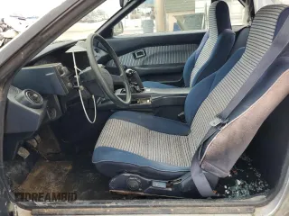 1989 Toyota MR2 z VIN JT2AW15C2K0146245, wystawiony jako Copart lot #87315874 z przebiegiem 162 741 mil mil oraz Tytuł czysty. Historia ofert i sprzedaży dostępna na DreamBid. Obrazek 7.