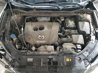 2016 Mazda CX-5 Grand Touring z VIN JM3KE2DY5G0821683, wystawiony jako Copart lot #51929905 z przebiegiem 119 392 mil mil oraz Czysty tytuł • Clean title. Historia ofert i sprzedaży dostępna na DreamBid. Obrazek 12.