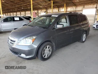 2007 Honda Odyssey Touring with VIN 5FNRL38847B123774, listed as a Copart auction lot 62596945 with 163,798 mi miles and Salvage title. Bid and sale history available at DreamBid. Image 1.