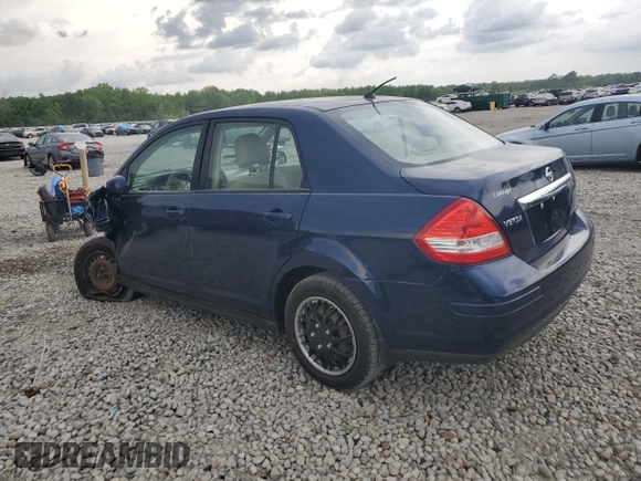 2009 Nissan Versa S with VIN 3N1BC11E19L433572, listed as a Copart auction lot 54084215 with 144,178 mi miles and Salvage title. Bid and sale history available at DreamBid. Image 2.