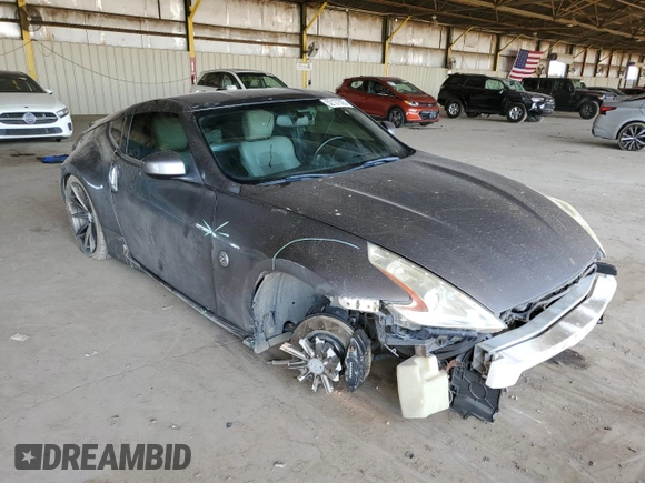 2012 Nissan 370Z Touring with VIN JN1AZ4EH9CM564312, listed as a Copart auction lot 52127525 with 134,465 mi miles and Salvage Title. Bid and sale history available at carsss.com. Image 4.