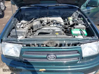 2000 Toyota 4Runner SR5 with VIN JT3HN86R1Y0323093, listed as a IAAI auction lot 41769405 with 156,905 mi miles. Bid and sale history available at carsss.com. Image 10.