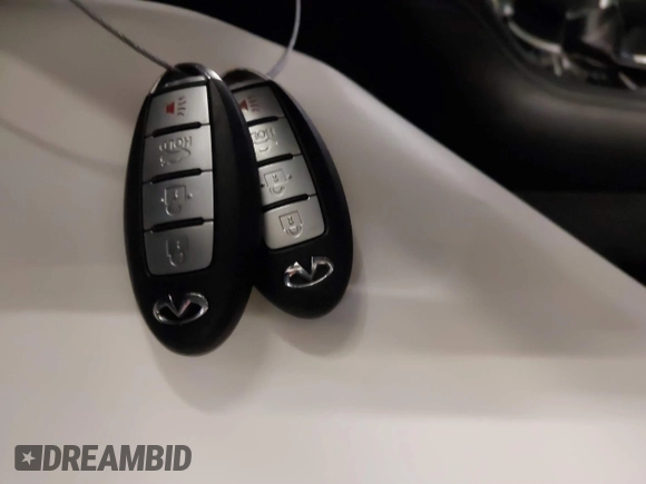 2015 Infiniti Q50 Premium z VIN JN1BV7AR0FM417283, wystawiony jako IAAI lot #41579549 z przebiegiem 112 407 mil mil oraz . Historia ofert i sprzedaży dostępna na DreamBid. Obrazek 11.