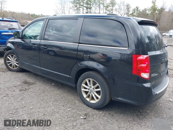 2019 Dodge Grand Caravan SXT with VIN 2C4RDGCG9KR804867, listed as a IAAI auction lot 42032311 with 157,351 mi miles and . Bid and sale history available at DreamBid. Image 3.