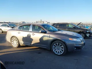 2012 Lincoln MKS with VIN 1LNHL9ER0CG801671, listed as a IAAI auction lot 41287565 with 137,903 mi miles. Bid and sale history available at carsss.com. Image 13.