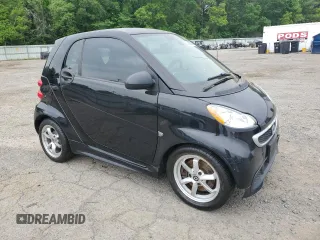 2014 Smart fortwo Pure z VIN WMEEJ3BA2EK733447, wystawiony jako Copart lot #53882735 z przebiegiem Nie podano mil oraz Tytuł czysty. Historia ofert i sprzedaży dostępna na DreamBid. Obrazek 4.