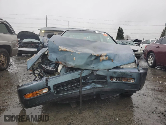 1996 Honda Accord Value with VIN 1HGCD5693TA266021, listed as a Copart auction lot 86699844 with 237,152 mi miles and Salvage Title. Bid and sale history available at DreamBid. Image 5.