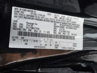 2015 Ford Focus Titanium with VIN 1FADP3N2XFL300859, listed as a IAAI auction lot 41944410 with 76,194 mi miles. Bid and sale history available at carsss.com. Image 9.