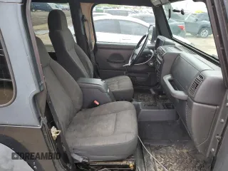 2003 Jeep Wrangler Sport z VIN 1J4FA49S13P374688, wystawiony jako Copart lot #58296735 z przebiegiem 184 554 mil mil oraz Czysty tytuł • Clean title. Historia ofert i sprzedaży dostępna na DreamBid. Obrazek 10.