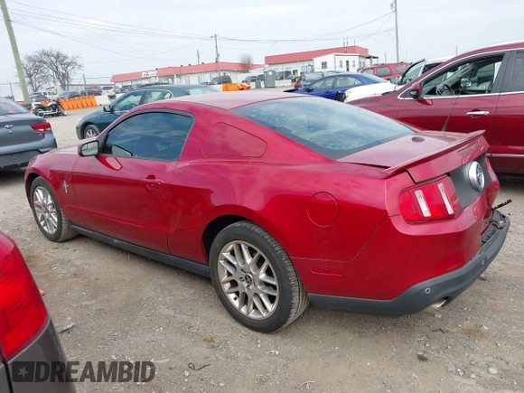 2012 Ford Mustang V6 Premium with VIN 1ZVBP8AM6C5262808, listed as a IAAI auction lot 41907866 with 121,630 mi miles. Bid and sale history available at carsss.com. Image 14.
