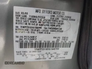 2005 Ford Five Hundred SE z VIN 1FAFP23185G168799, wystawiony jako IAAI lot #42202907 z przebiegiem Nie podano mil oraz . Historia ofert i sprzedaży dostępna na DreamBid. Obrazek 9.