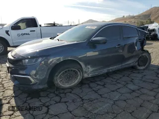 2021 Honda Civic Sedan LX with VIN 2HGFC2F69MH508639, listed as a Copart auction lot 82708084 with 86,699 mi miles and Salvage Title. Bid and sale history available at carsss.com. Image 1.