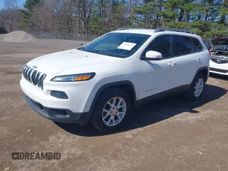 2015 Jeep Cherokee Latitude with VIN 1C4PJMCS8FW624375, listed as a IAAI auction lot 41848679 with 148,130 mi miles and . Bid and sale history available at DreamBid. Image 2.