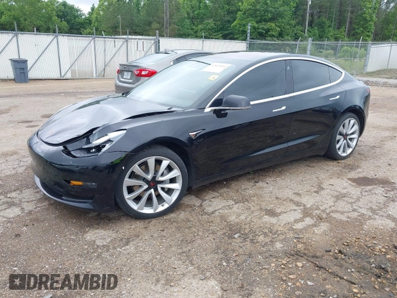 2018 Tesla Model 3 Long Range Battery z VIN 5YJ3E1EB3JF186733, wystawiony jako IAAI lot #42093891 z przebiegiem 102 435 mil mil oraz . Historia ofert i sprzedaży dostępna na DreamBid. Obrazek 19.