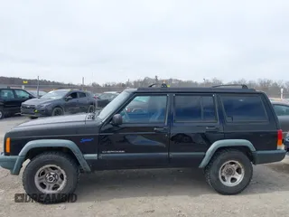 1998 Jeep Cherokee Sport with VIN 1J4FJ68S3WL285200, listed as a IAAI auction lot 41834529 with 335,881 mi miles and . Bid and sale history available at DreamBid. Image 6.