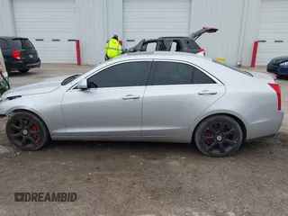 2014 Cadillac ATS Standard AWD with VIN 1G6AG5RX9E0179422, listed as a IAAI auction lot 41826487 with 121,061 mi miles and . Bid and sale history available at carsss.com. Image 14.