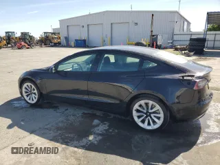 2022 Tesla Model 3 z VIN 5YJ3E1EA5NF189274, wystawiony jako Copart lot #57160765 z przebiegiem 127 420 mil mil oraz Szkoda całkowita • Salvage title. Historia ofert i sprzedaży dostępna na DreamBid. Obrazek 2.
