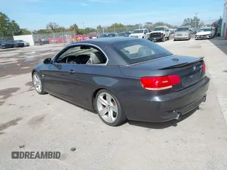 2007 BMW 3 Series 335i with VIN WBAWL73587PX47653, listed as a IAAI auction lot 41428352 with 225,457 mi miles. Bid and sale history available at carsss.com. Image 3.