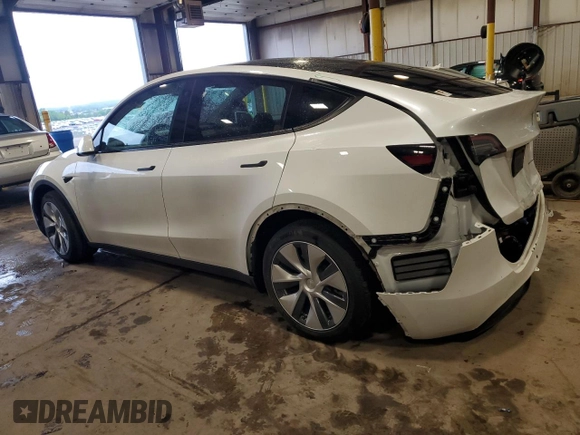2022 Tesla Model Y Long Range z VIN 7SAYGDEEXNA012904, wystawiony jako Copart lot #57492865 z przebiegiem 31 294 mil mil oraz Szkody całkowita. Historia ofert i sprzedaży dostępna na DreamBid. Obrazek 2.