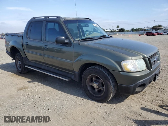 2004 Ford Explorer Sport Trac XLS with VIN 1FMZU67K64UA39174, listed as a Copart auction lot 61035465 with 196,912 mi miles and Salvage title. Bid and sale history available at DreamBid. Image 4.