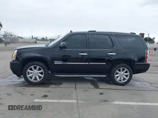 2013 GMC Yukon Denali with VIN 1GKS2EEF2DR348109, listed as a IAAI auction lot 41895426 with 121,590 mi miles. Bid and sale history available at carsss.com. Image 14.