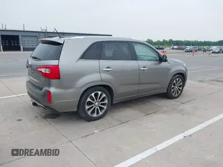 2014 Kia Sorento SX z VIN 5XYKW4A77EG434282, wystawiony jako IAAI lot #42513036 z przebiegiem 175 186 mil mil oraz . Historia ofert i sprzedaży dostępna na DreamBid. Obrazek 4.