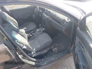 2006 Mazda 3 i Touring with VIN JM1BK32F361455126, listed as a IAAI auction lot 41777285 with 143,499 mi miles and . Bid and sale history available at DreamBid. Image 5.