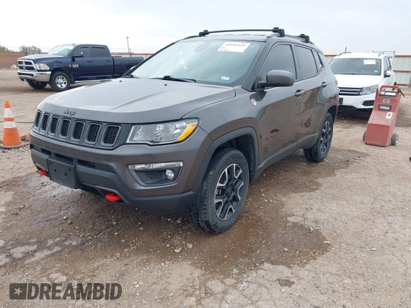 2019 Jeep Compass Trailhawk with VIN 3C4NJDDBXKT795294, listed as a IAAI auction lot 42046344 with 100,395 mi miles and . Bid and sale history available at DreamBid. Image 2.