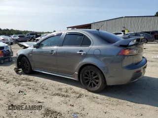 2010 Mitsubishi Lancer ES with VIN JA32U2FU8AU010321, listed as a Copart auction lot 68088294 with 157,903 mi miles and Salvage Title. Bid and sale history available at carsss.com. Image 2.